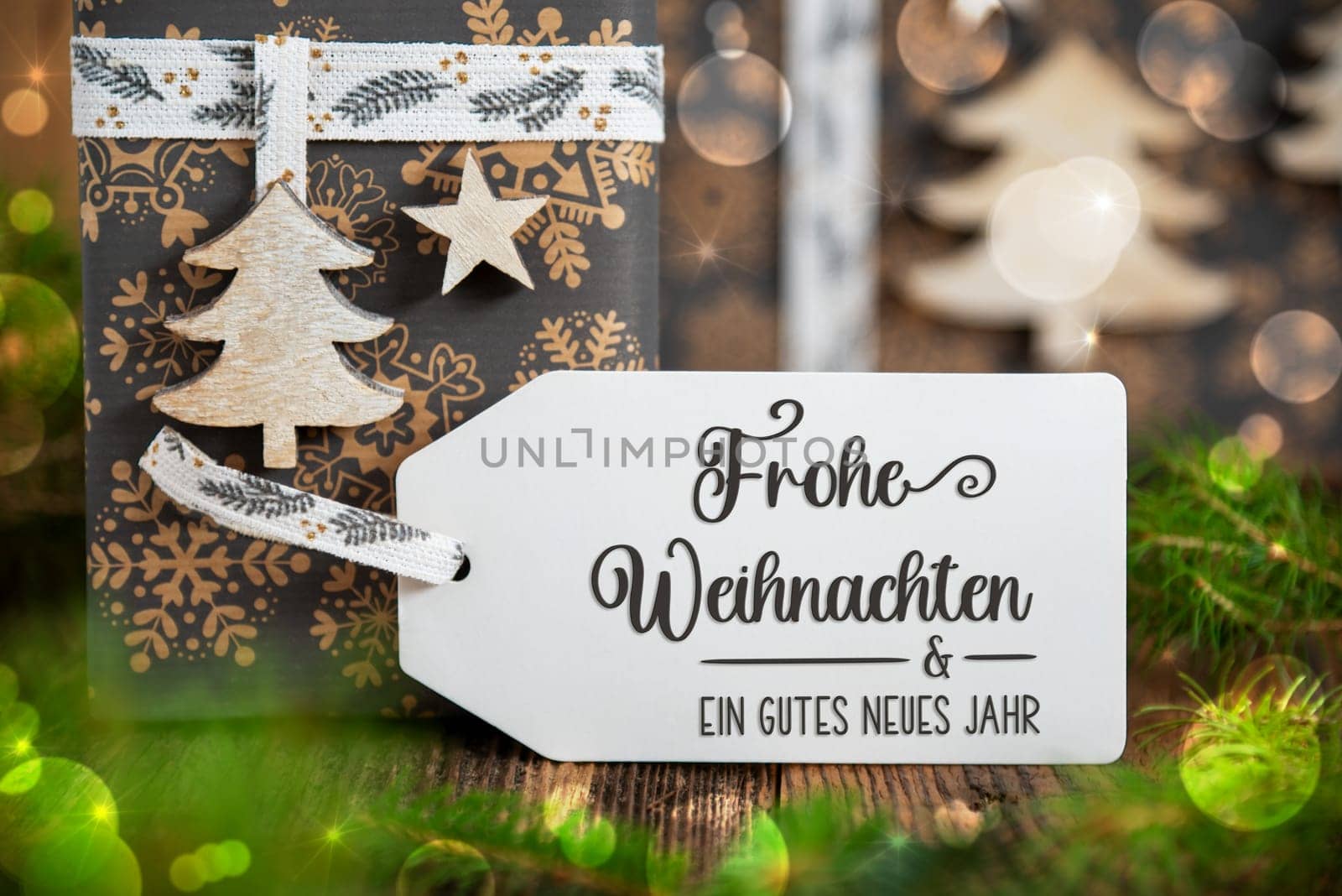 German Text Frohe Weihnachten Und Ein Gutes Neues Jahr, Means Merry Christmas And Happy New Year In English, On A White Label With Christmas Presents, Winter Gifts, Natural, Eco Friendly Background