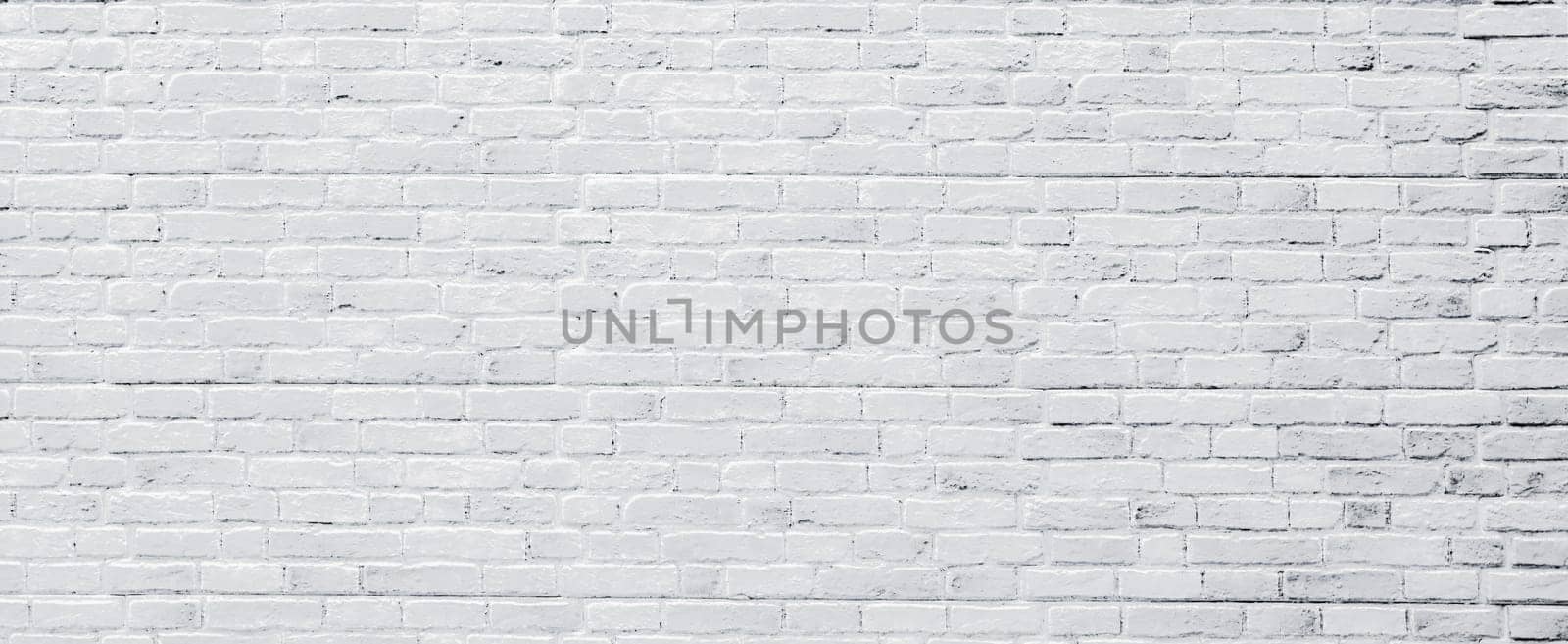 Brick wall and wooden floor, antique old grunge white grey texture wide panorama background.