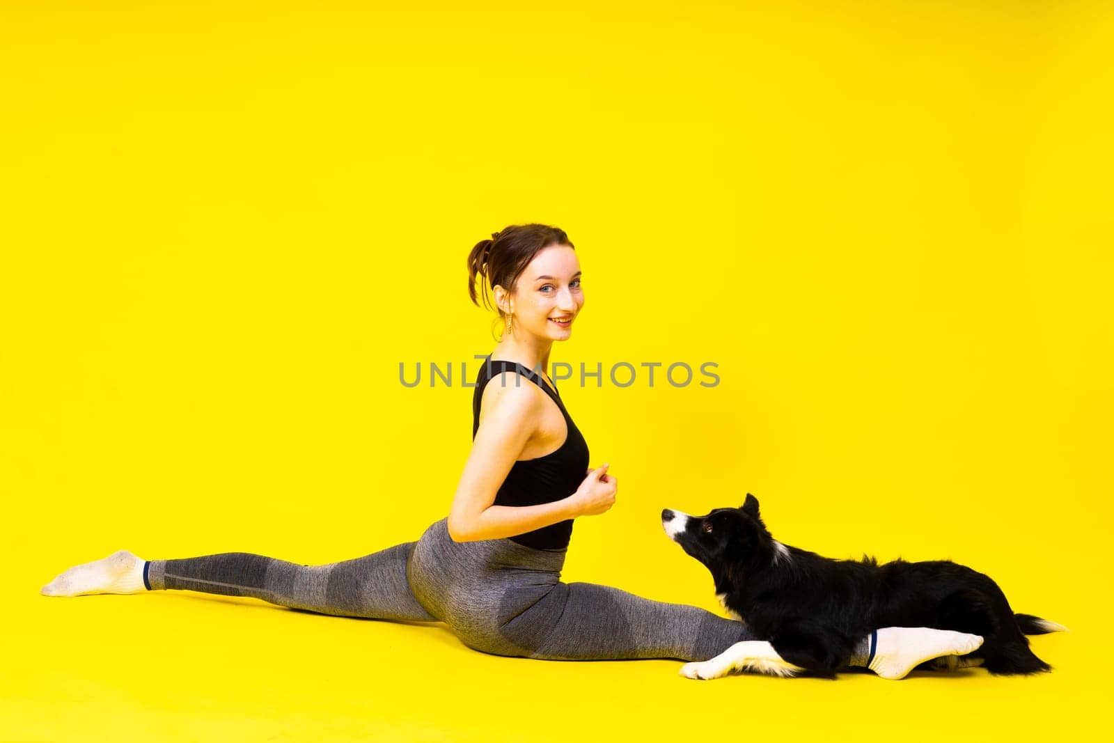Friendship between people and animals, a studio shot, love, tender, warm feeling and emotion