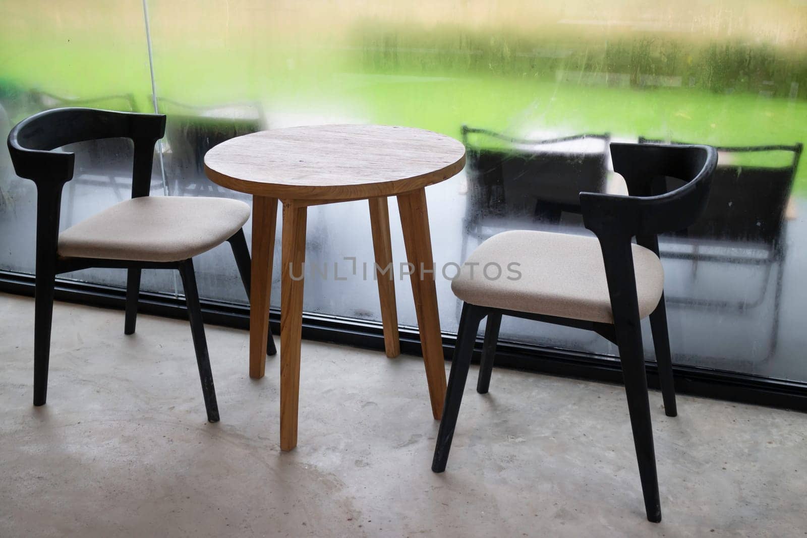 Looking at the rain through the window, stock photo
