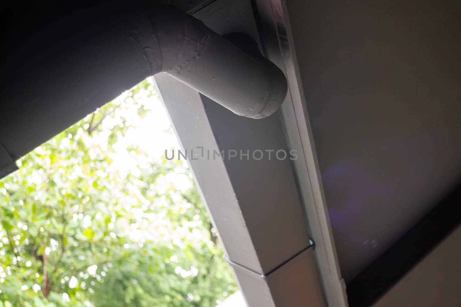 House exterior style with black roof tiles, stock photo