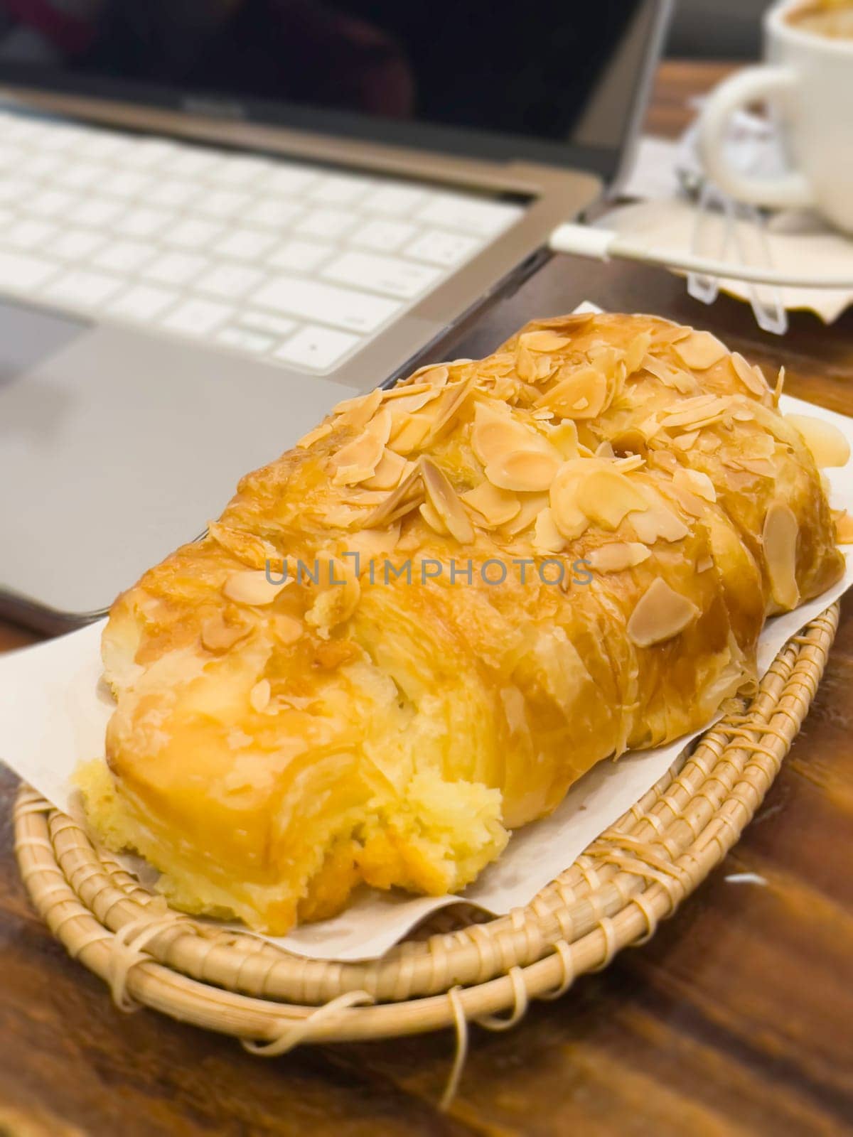 French breakfast with pastries at work from home, stock photo