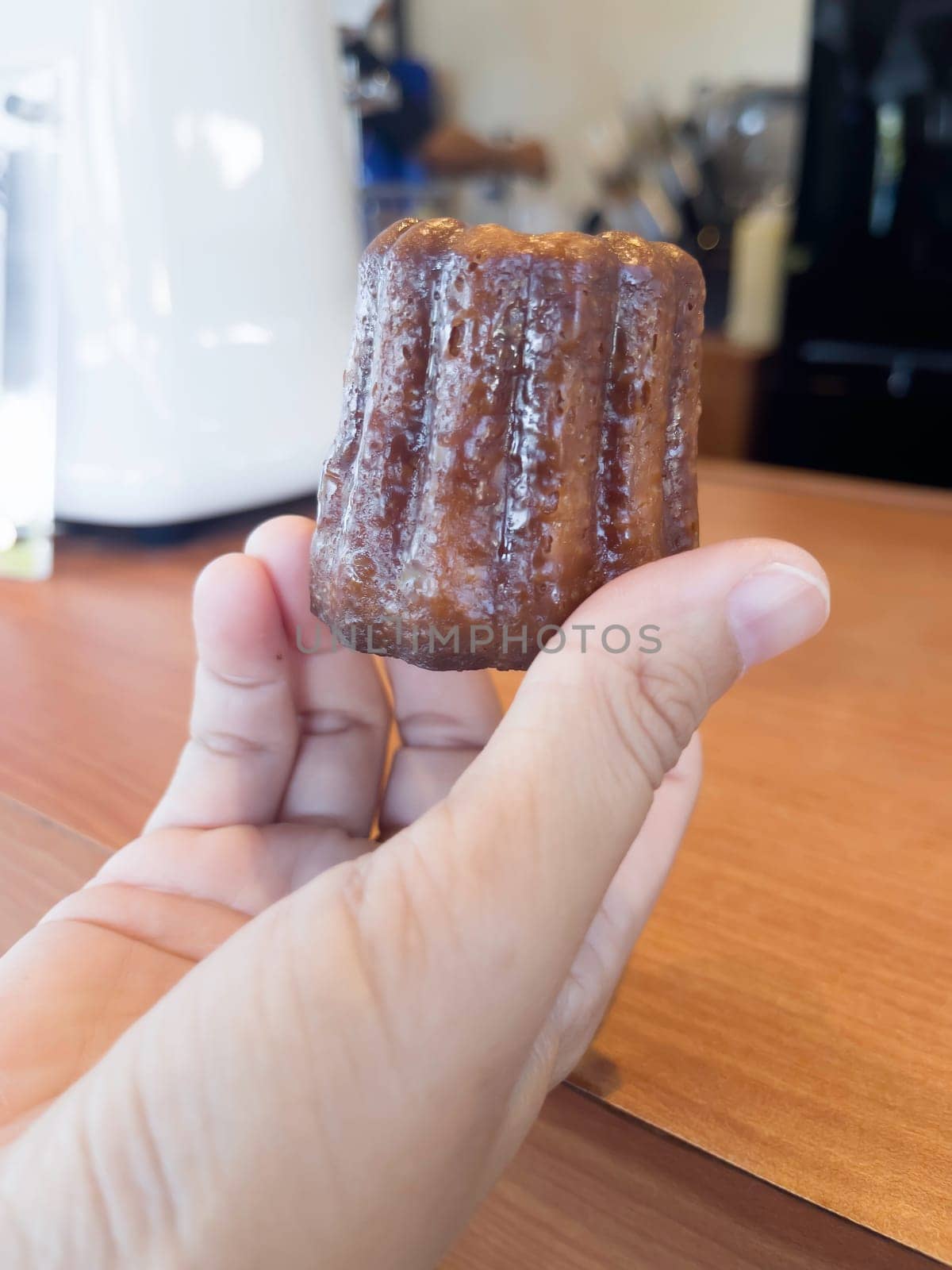 Fresh homemade caneles french pastry, stock photo