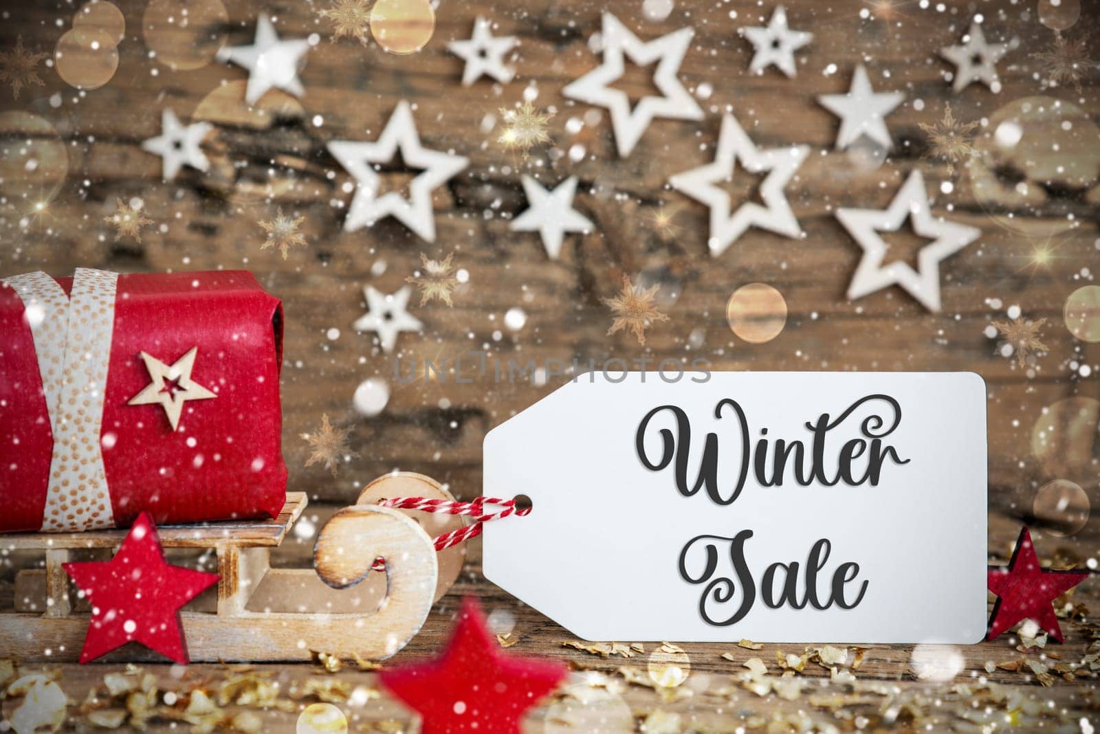 Wooden Sled With Red Gift And Rustic Snowy Christmas Background With Label With Text Winter Sale