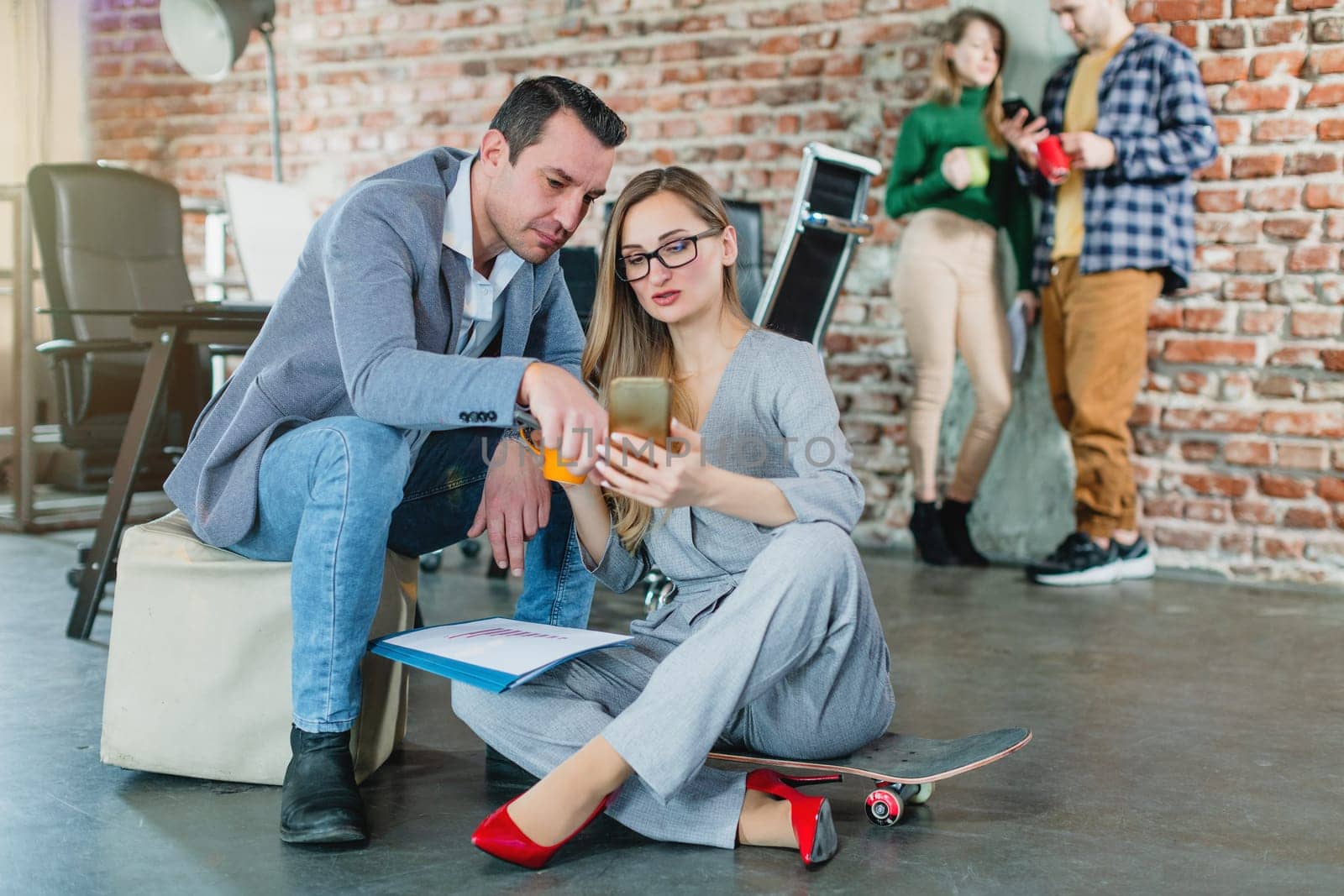 Fresh and young businesspeople working together in start-up business
