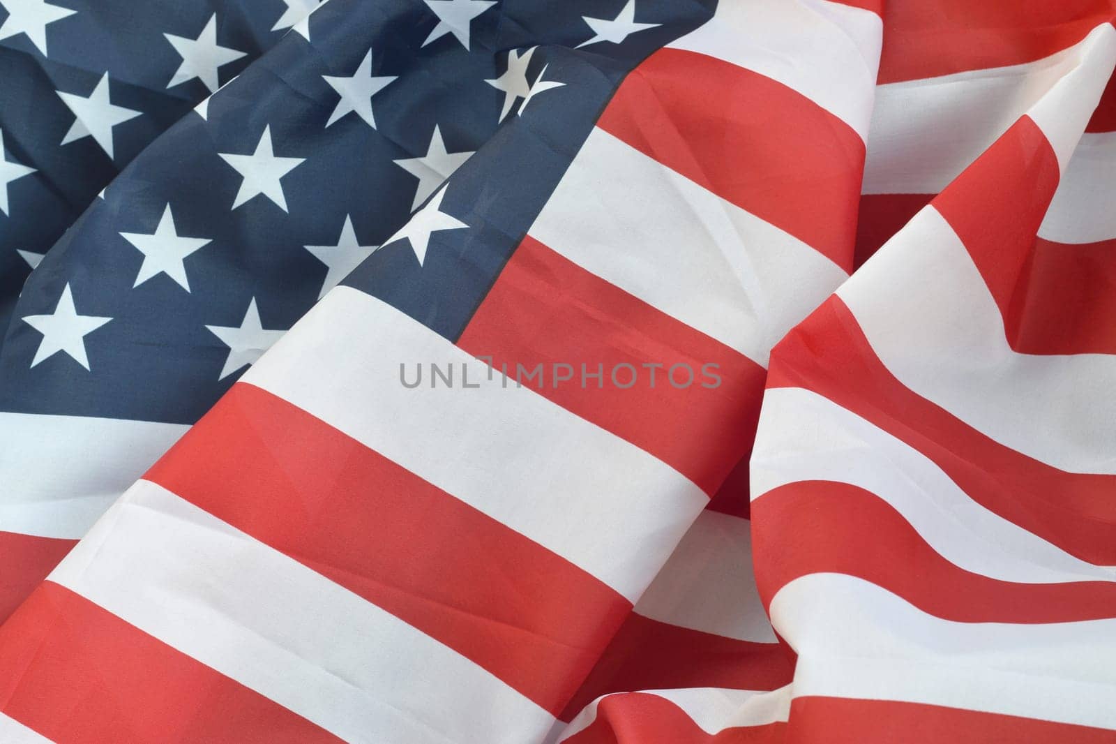 United States of America waving flag with many folds. Patriotic background for USA Memorial Day design