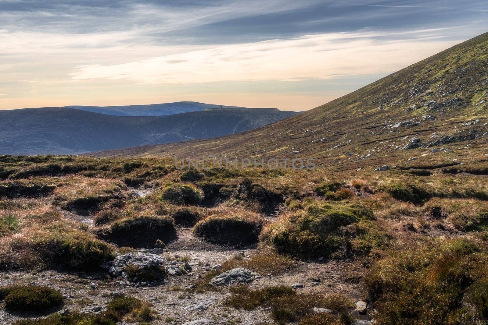 Turlough Hill with artificial reservoir, lake for hydroelectric powerplant seen from Tonelagee Mountain. Hiking in Wicklow Mountains, Ireland