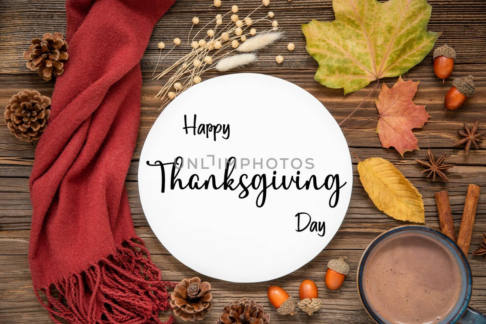 Autumn Decoration, Flat Lay With Colorful Maple Leaves, Cozy Atmosphere and Label With Text Happy Thanksgiving Day