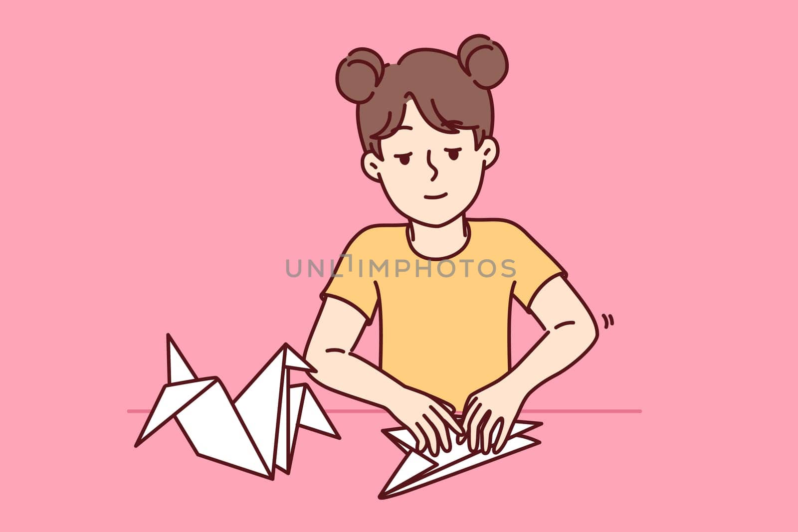 Little girl makes origami bird by folding paper animals and developing own creativity. Child is engaged in origami art, preparing fake for school exhibition and dreaming of becoming sculptor