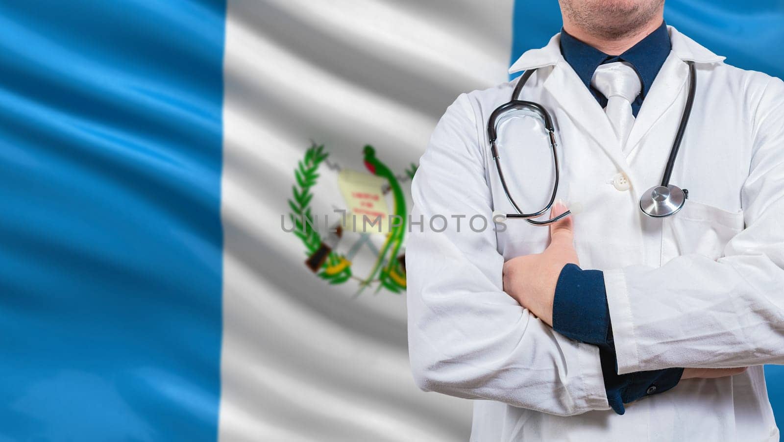 Doctor with stethoscope on guatemala flag. Doctor arms crossed with stethoscope on Guatemala flag, Guatemala national health concept