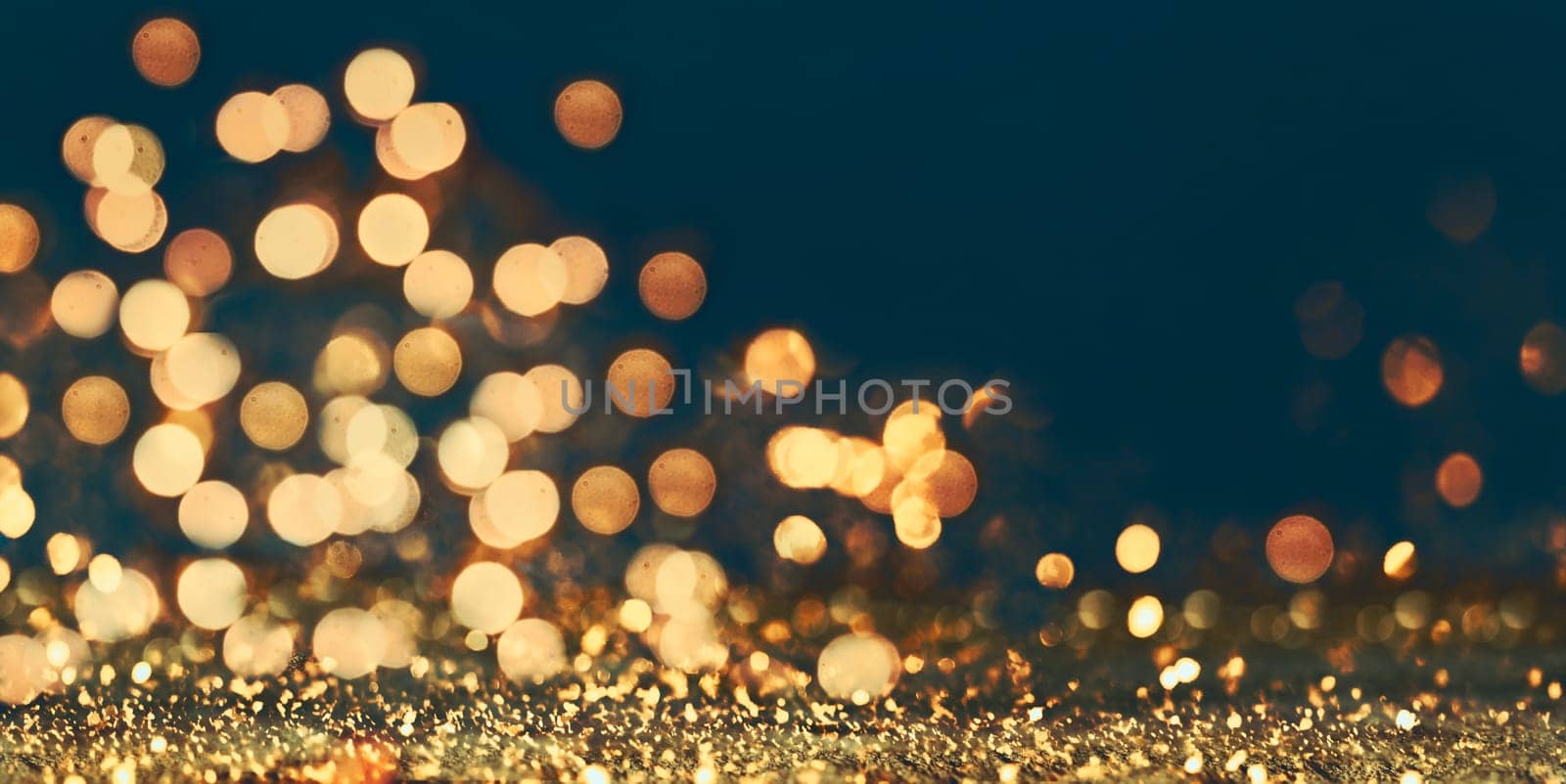 Abstract blur golden glitter border on black background. Luxury card design for new year, christmas and holiday celebration. Party bokeh sparkle confetti textured layout. Classy elegant banner.