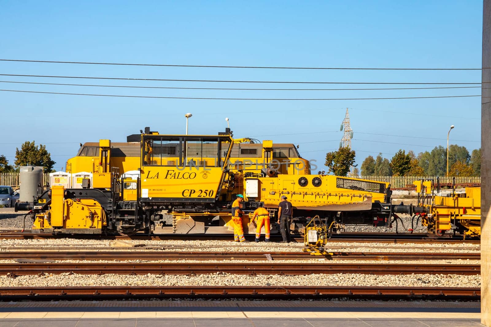 MILAZZO, SICILY, Italy - 03 October 2023. La Falco CP500 at the railway station in Milazzo is a ballast regulator machine. It is suitable for use as a towing locomotive.