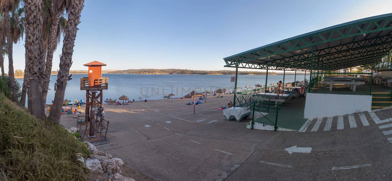 Orellana, Spain - August 4th, 2023: Costa Dulce de Orellana, unique inland beach in Spain awarded with the Blue Flag, Badajoz, Spain