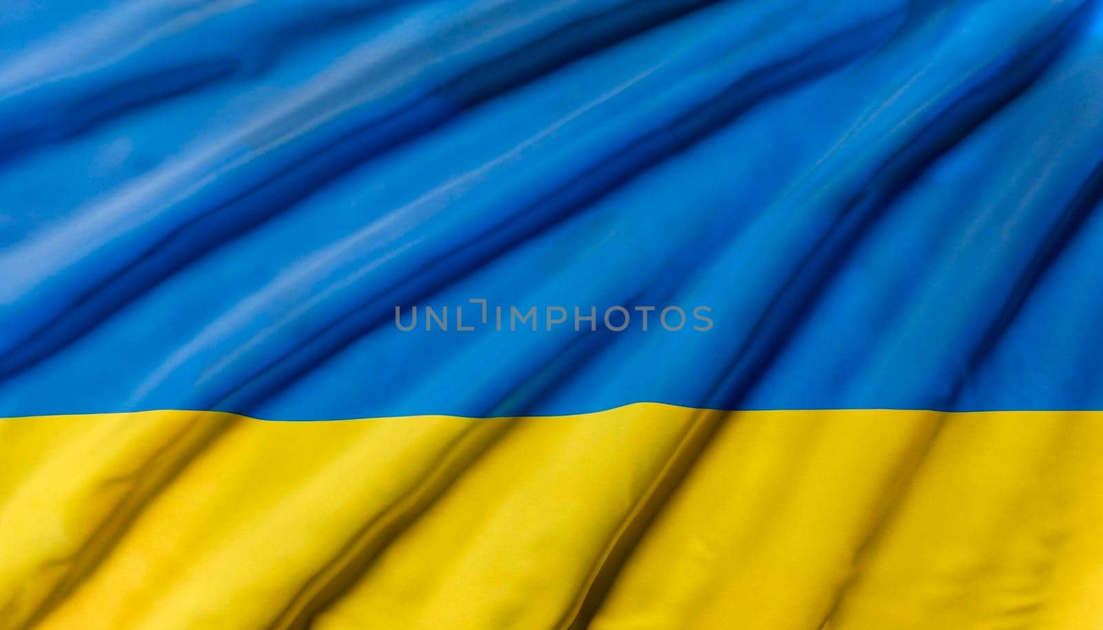 Beautiful silk flag of Ukraine with soft folds in the wind.