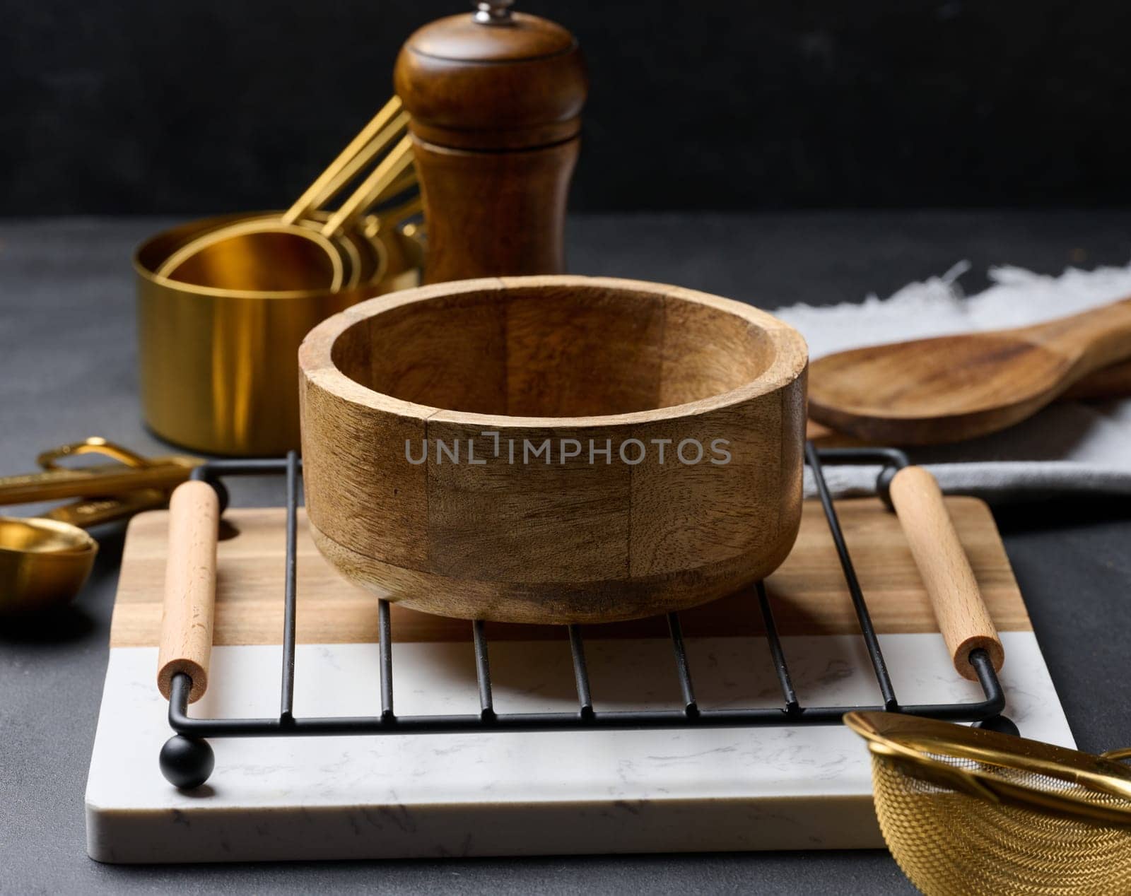 Empty round wooden bowl on the table