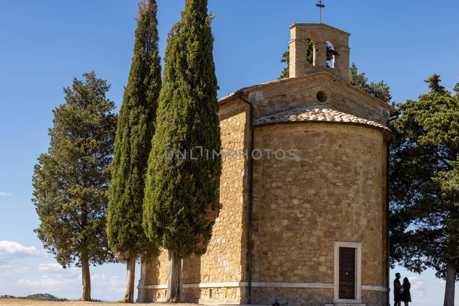 Pienza, Italy - September 12, 2022: Capella Di Vitaleta in countryside between San Quirico and Pienza in Val d Orcia Tuscany. Italy