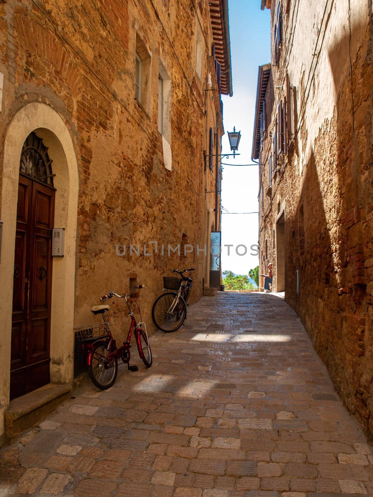 Pienza, Italy - Sept 12, 2022: Pienza, a tiny village in the Tuscany, known as the ideal city of the Renaissance and a capital of pecorino cheese. UNESCO World Heritage Site.
