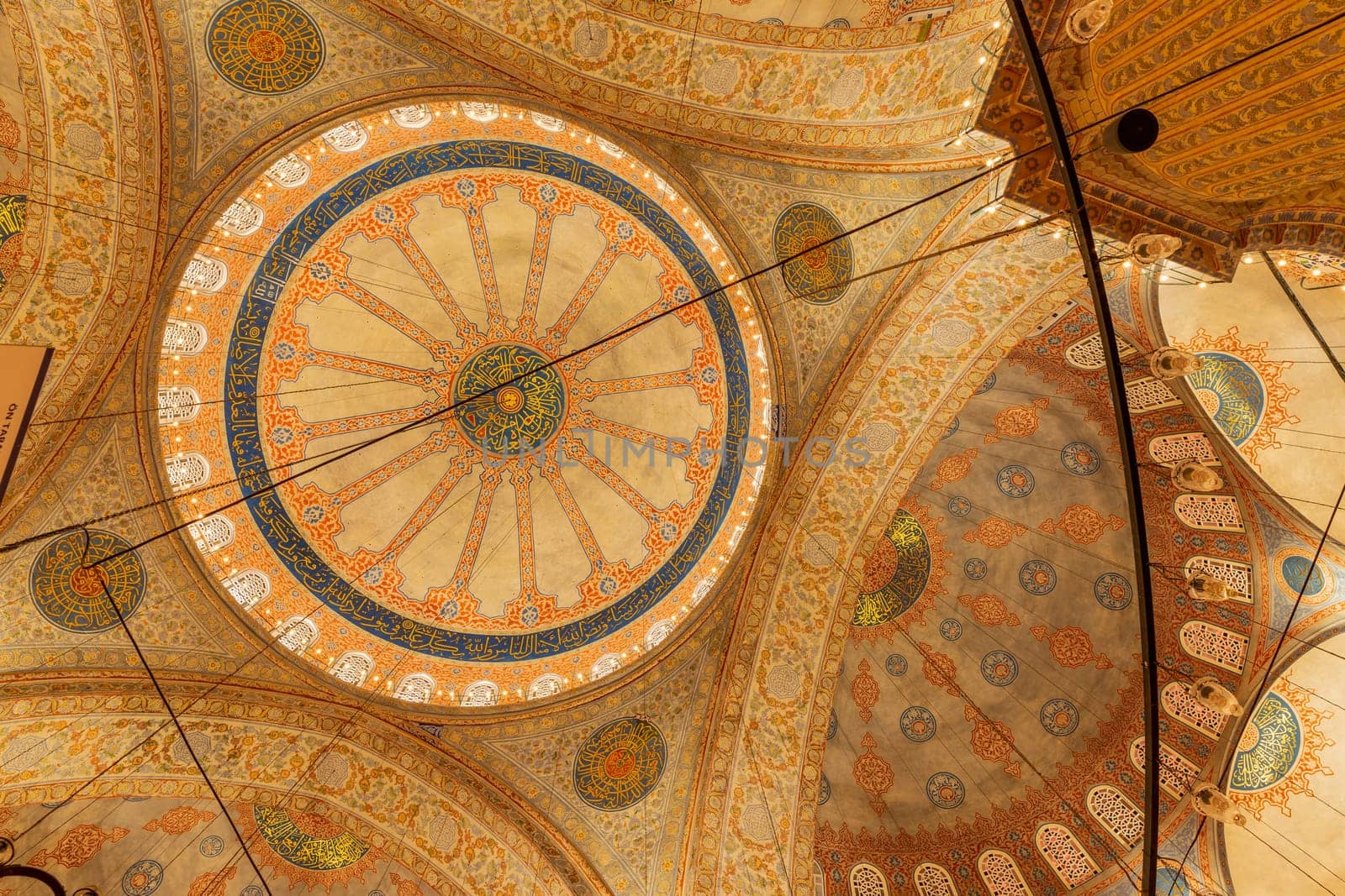 Istanbul, Turkey - June 05, 2023: View of interior geometric painting at the ceiling of Blue Mosque or Sultan Ahmed Mosque in Istanbul, Turkey.