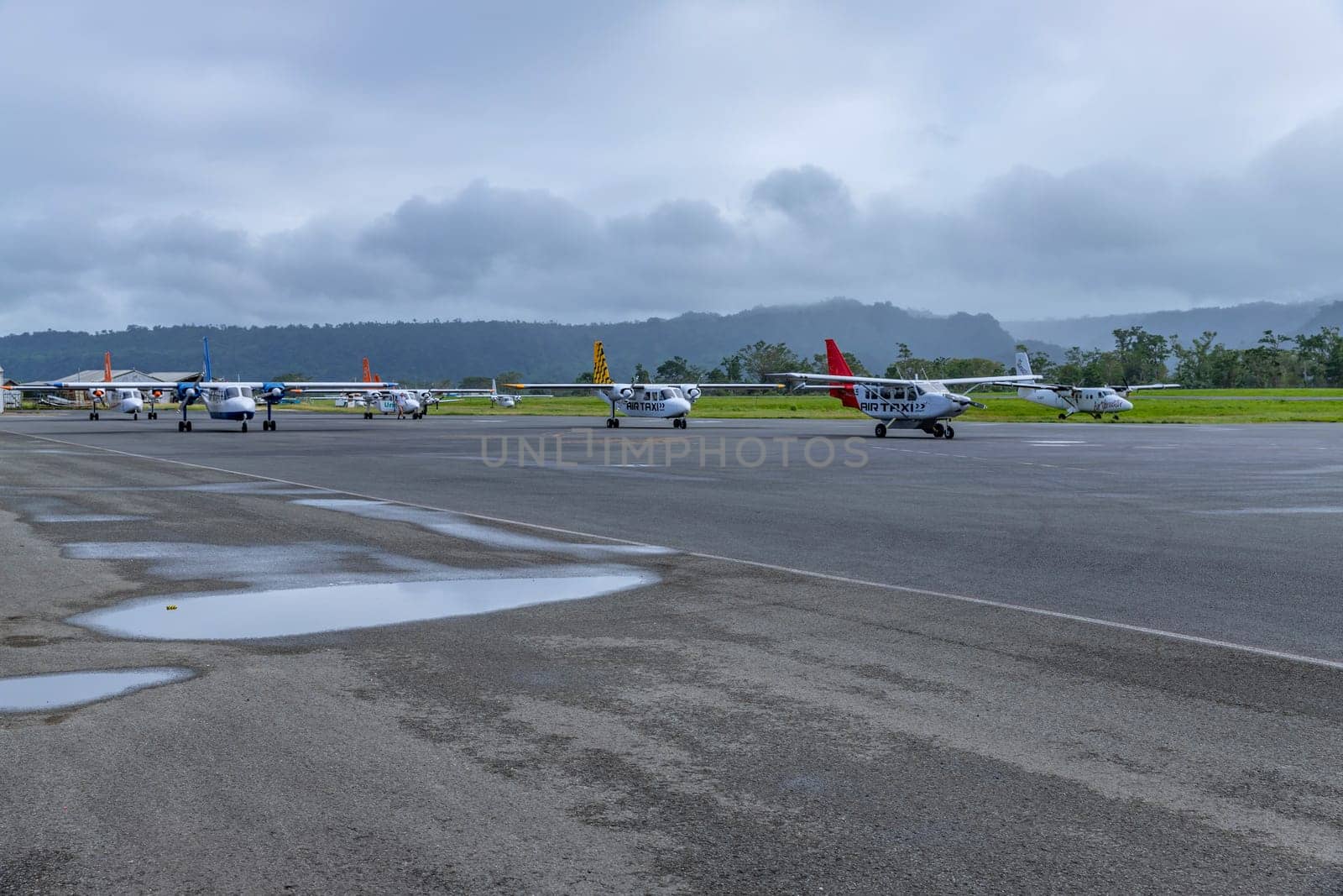 Ouvea, New Caledonia: 2 June 2023: Airplanes at the airport on Ouvea Island, Loyalty Islands, New Caledonia.