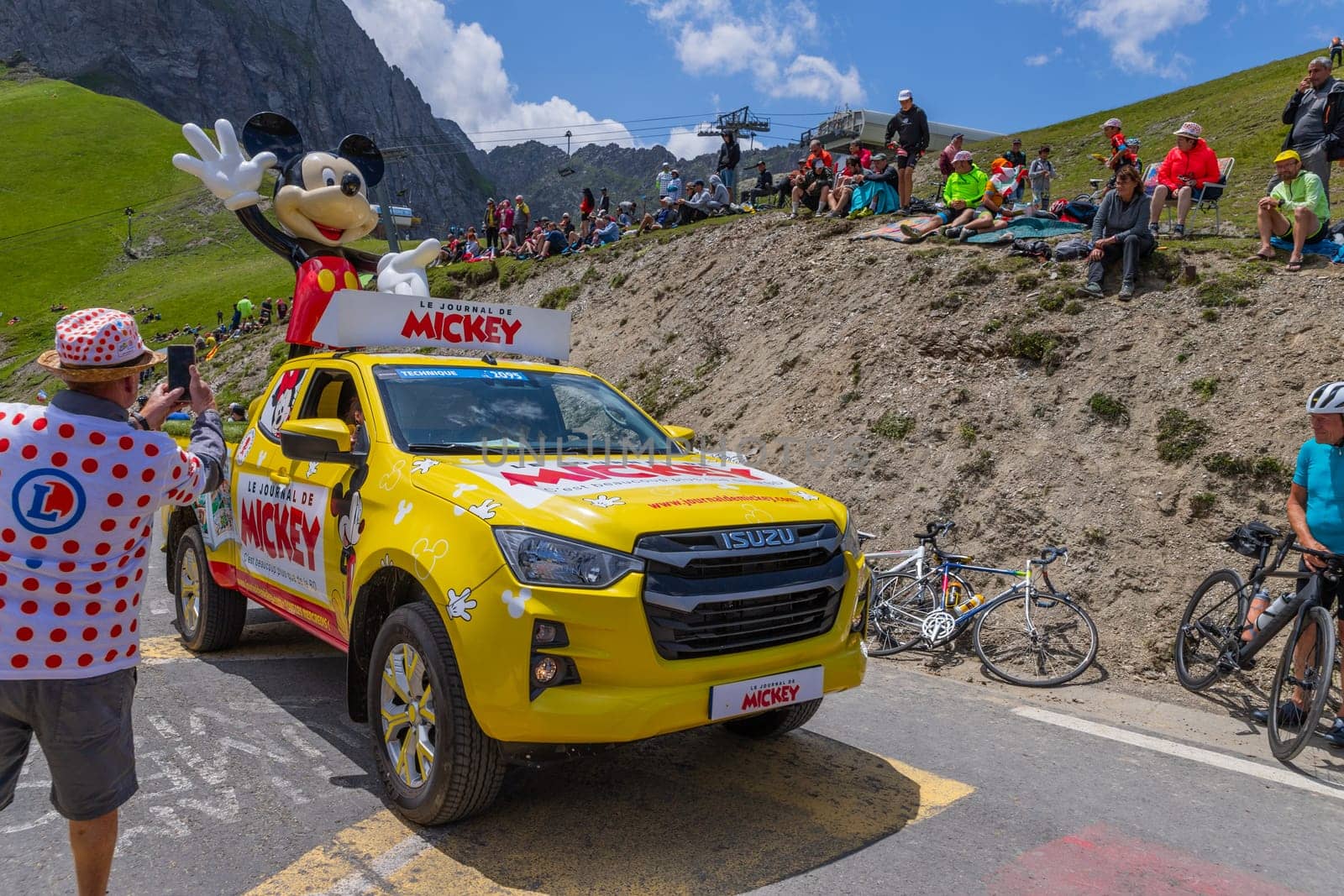 Col du Tourmalet, France - July 06 2023: Caravan car at the top of the Col du Tourmalet in Pyerenees mountains during the stage 6 of Le Tour de France 2023
