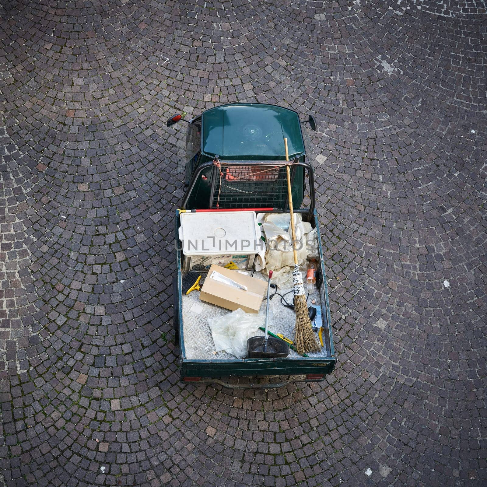 Street cleaning vehicle in the old town of Malcesine on Lake Garda in Italy