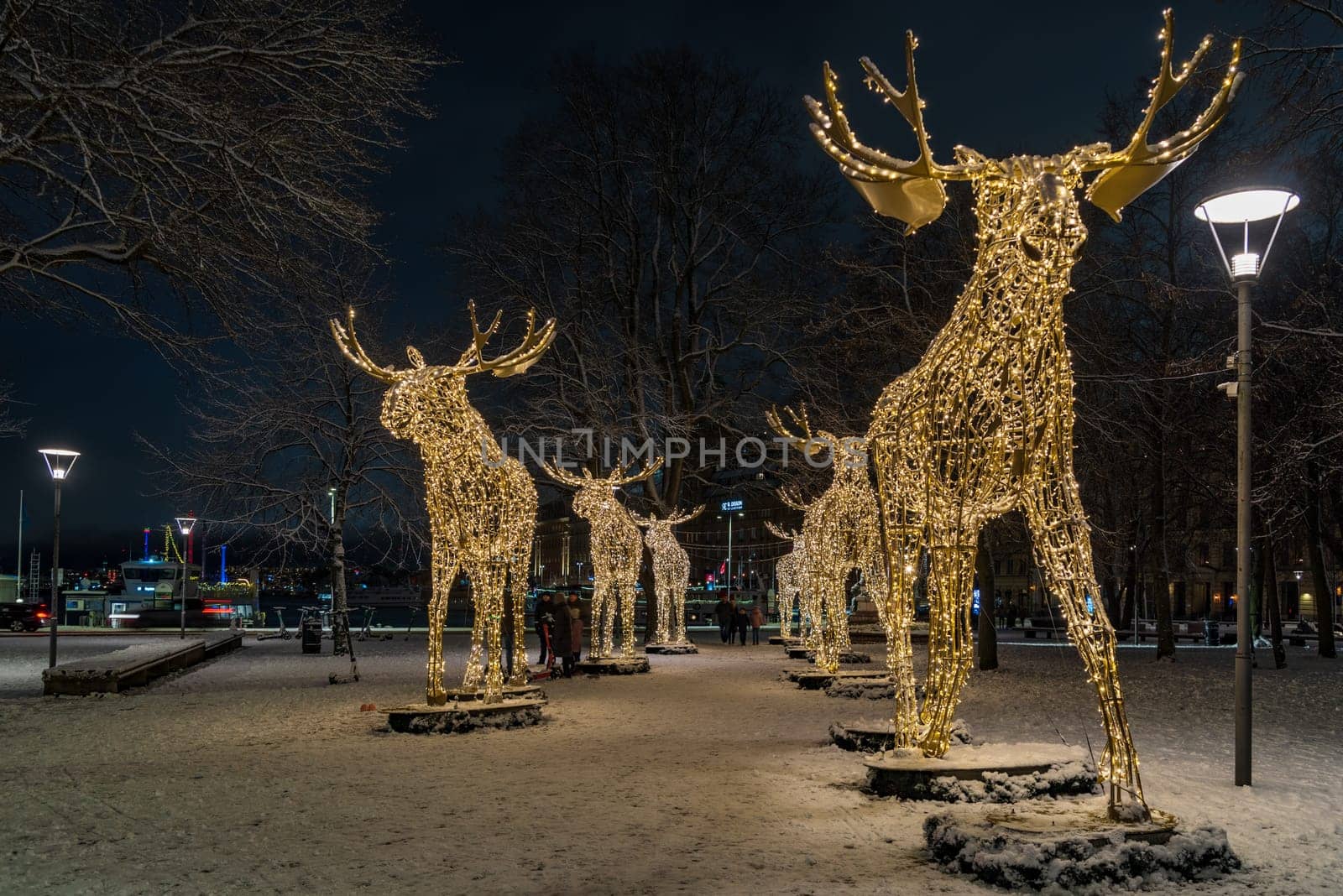 STOCKHOLM, SWEDEN- DECEMBER 24, 2020: Enormous christmas moose made of decorative lights in the swedish capital