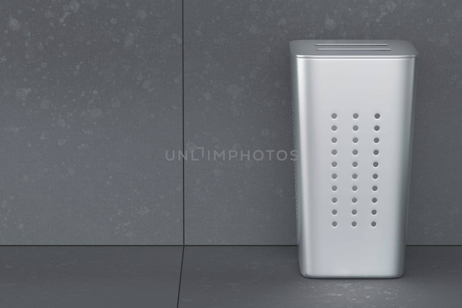 Silver laundry hamper with lid in empty laundry room