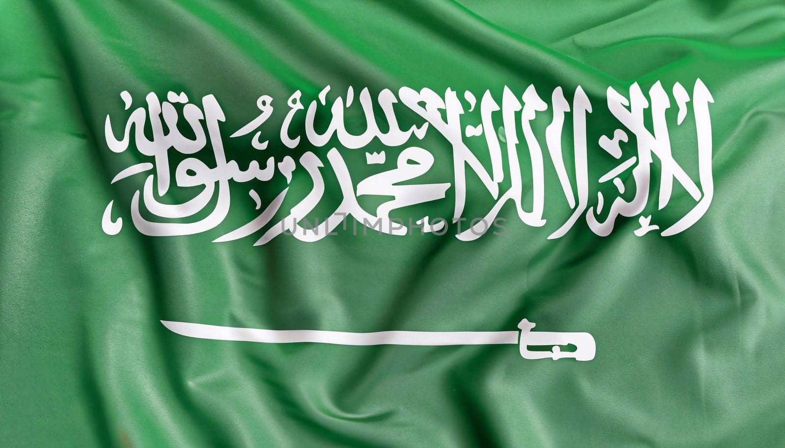 Saudi Arabia flag is depicted on a sports cloth fabric with many folds. Sport team banner