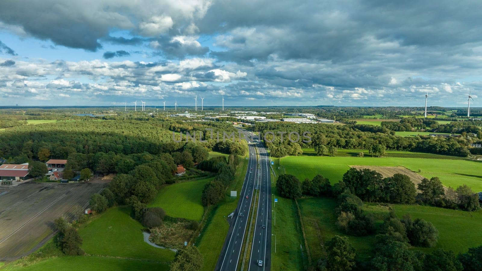 aerial view of the E30 highway just before the german border in eastern netherlands. European route E 30 is a west–east European route, running from Cork in Ireland to Omsk in Russia. In the Netherlands, the highway runs from Hook of Holland eastwards through The Hague, Utrecht, Amersfoort and Apeldoorn to the German border, near De Lutte.