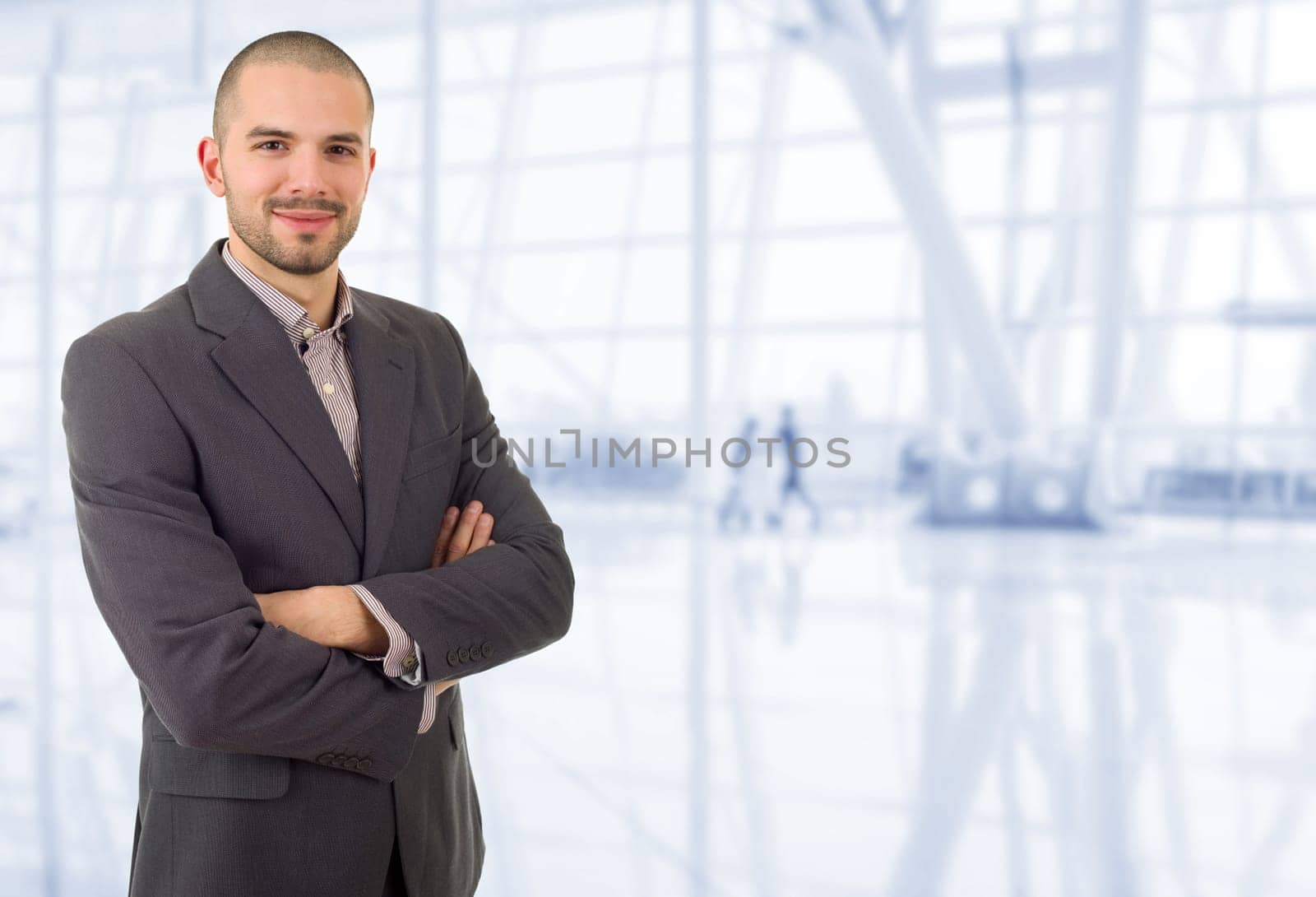 happy business man portrait at the office