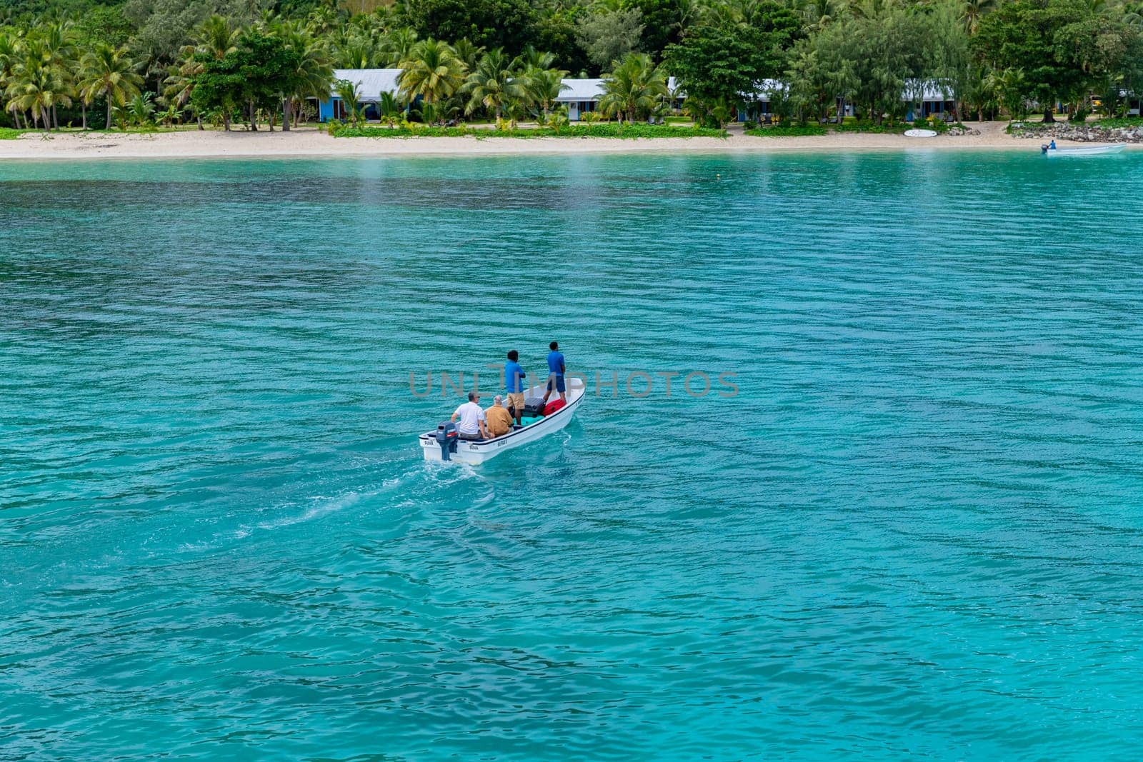 Nacula Fiji: June 25 2023: Group of tourists on a ship in the coast of Nadi, Fiji Islands