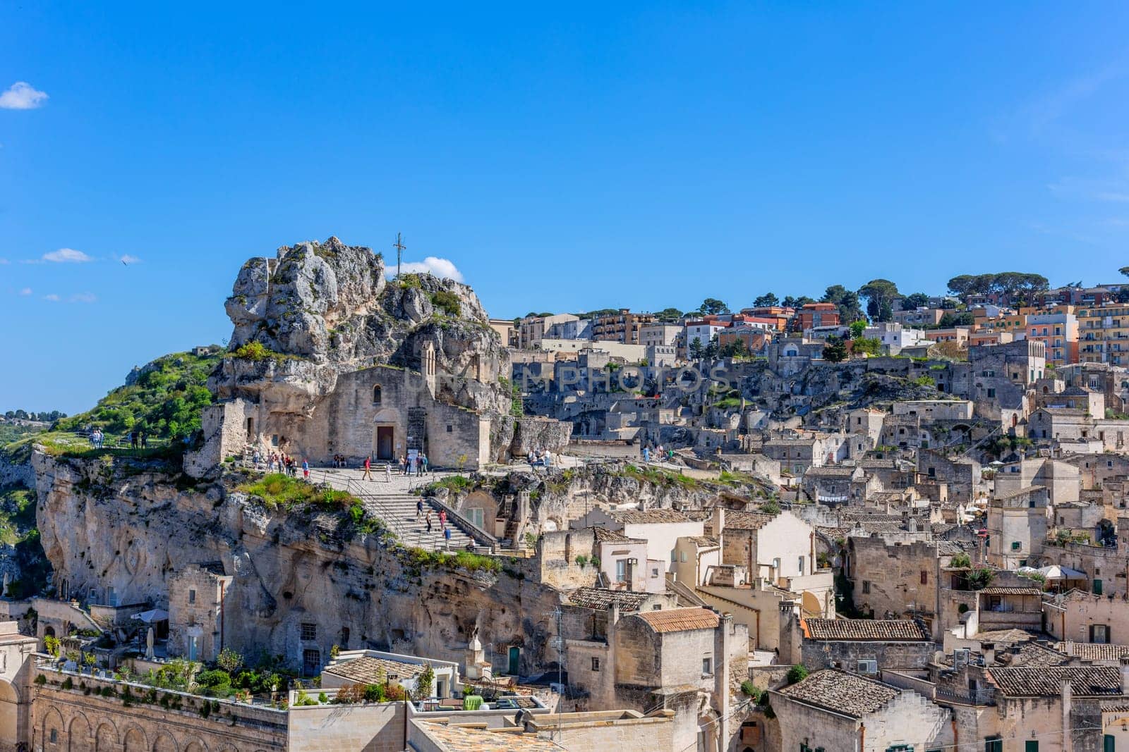 Matera, Italy - 6 May 2023: Ancient Unesco heritage old town of Matera (Sassi di Matera), Basilicata, southern Italy. Prehistoric cave dwellings