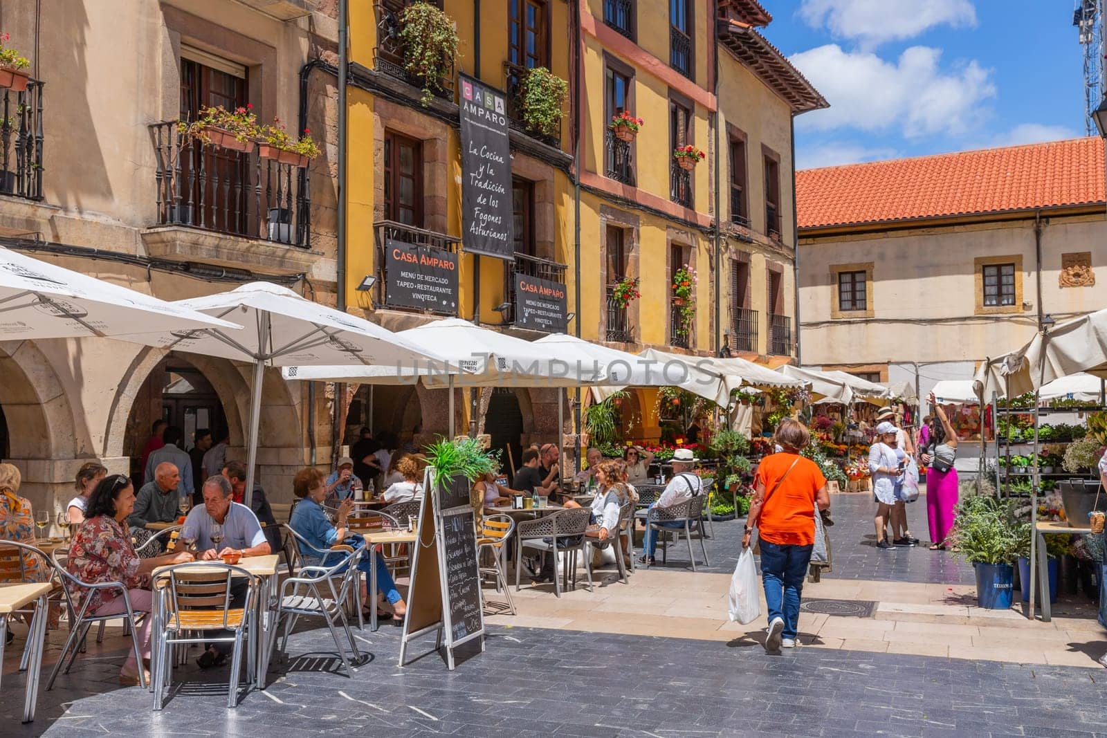 Oviedo, Asturias, Spain - July 16, 2023: City life in the summer in the streets of Oviedo. Oviedo is located in the centre of Asturias between the Nalón River and Nora River.