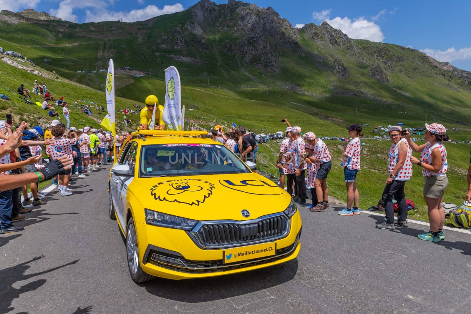 Col du Tourmalet, France - July 06 2023: Caravan car at the top of the Col du Tourmalet in Pyerenees mountains during the stage 6 of Le Tour de France 2023
