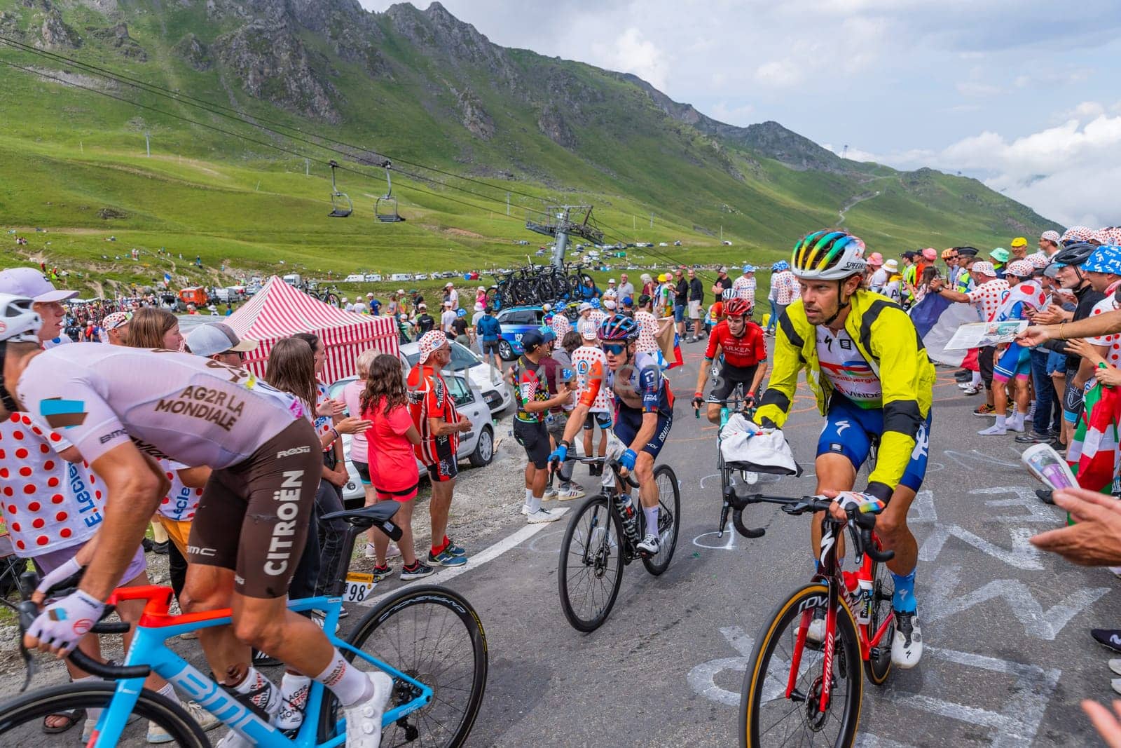 Col du Tourmalet, France - July 06 2023: Riders climbig the road to Col du Tourmalet in Pyerenees mountains during the stage 6 of Le Tour de France 2023.