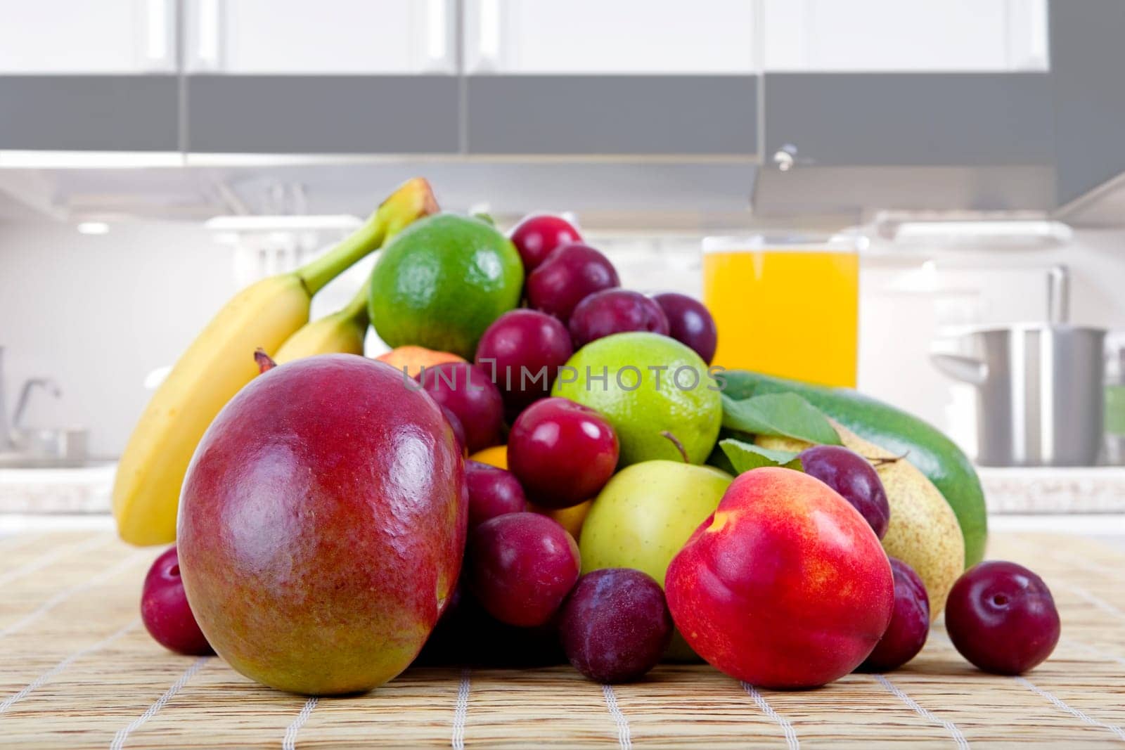 fruits and juice at the kitchen table