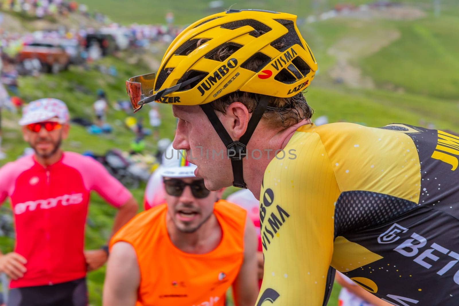 Col du Tourmalet, France - July 06 2023: Nathan van Hooydonck climbig the road to Col du Tourmalet in Pyerenees mountains during the stage 6 of Le Tour de France 2023.