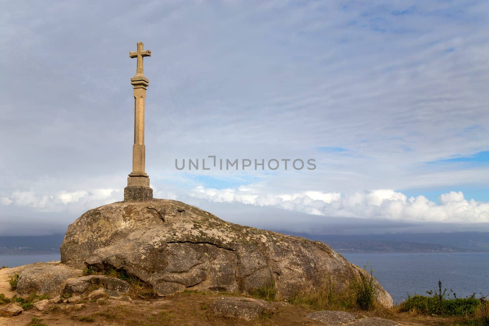 Finisterre cross, the end of the Camino de Santiago (The Way of St James). Galicia, Spain