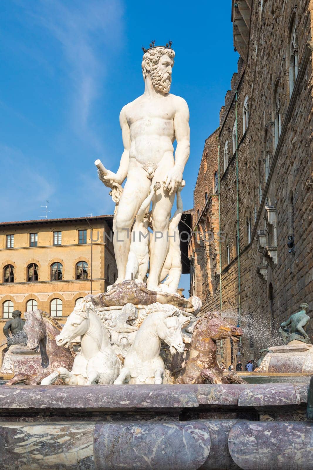 Florence, Italy - Neptune Fountain. Marble sculpture, Renaissance masterpiece, naked Poseidon statue