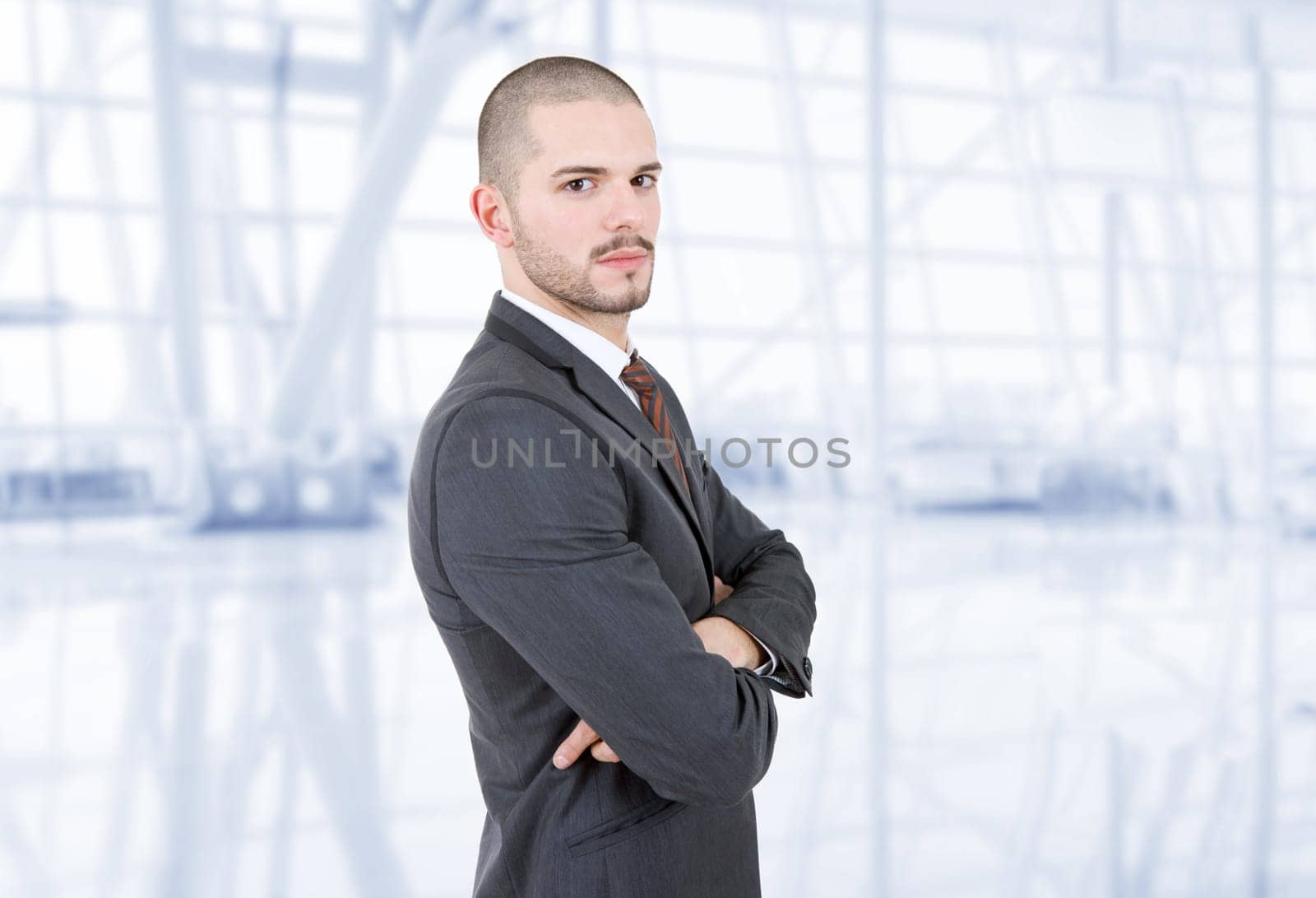 young business man portrait at the office