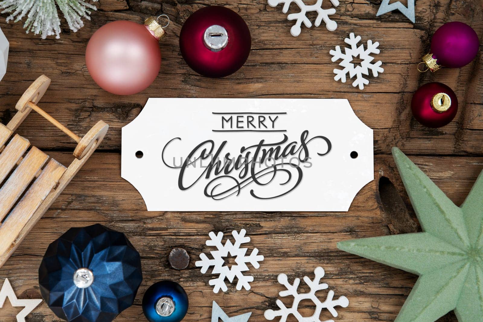Rustic And Festive Christmas Decoration With White Sign With Text Merry Christmas