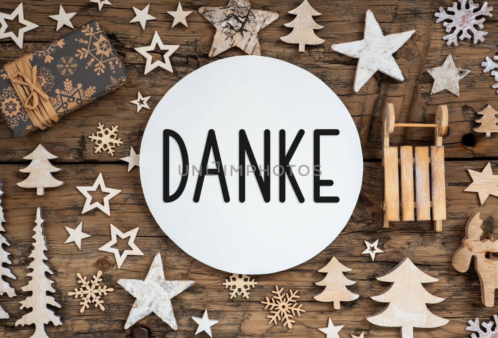 German Text Danke, Means Thanks In English, On Wooden Background, Natural Christmas Decor, Winter Eco Friendly Flatlay