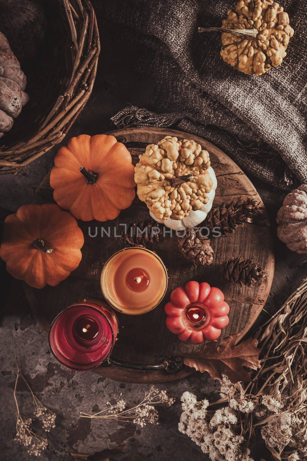 Home decoration with pumpkins and candles for Thanksgiving and Halloween