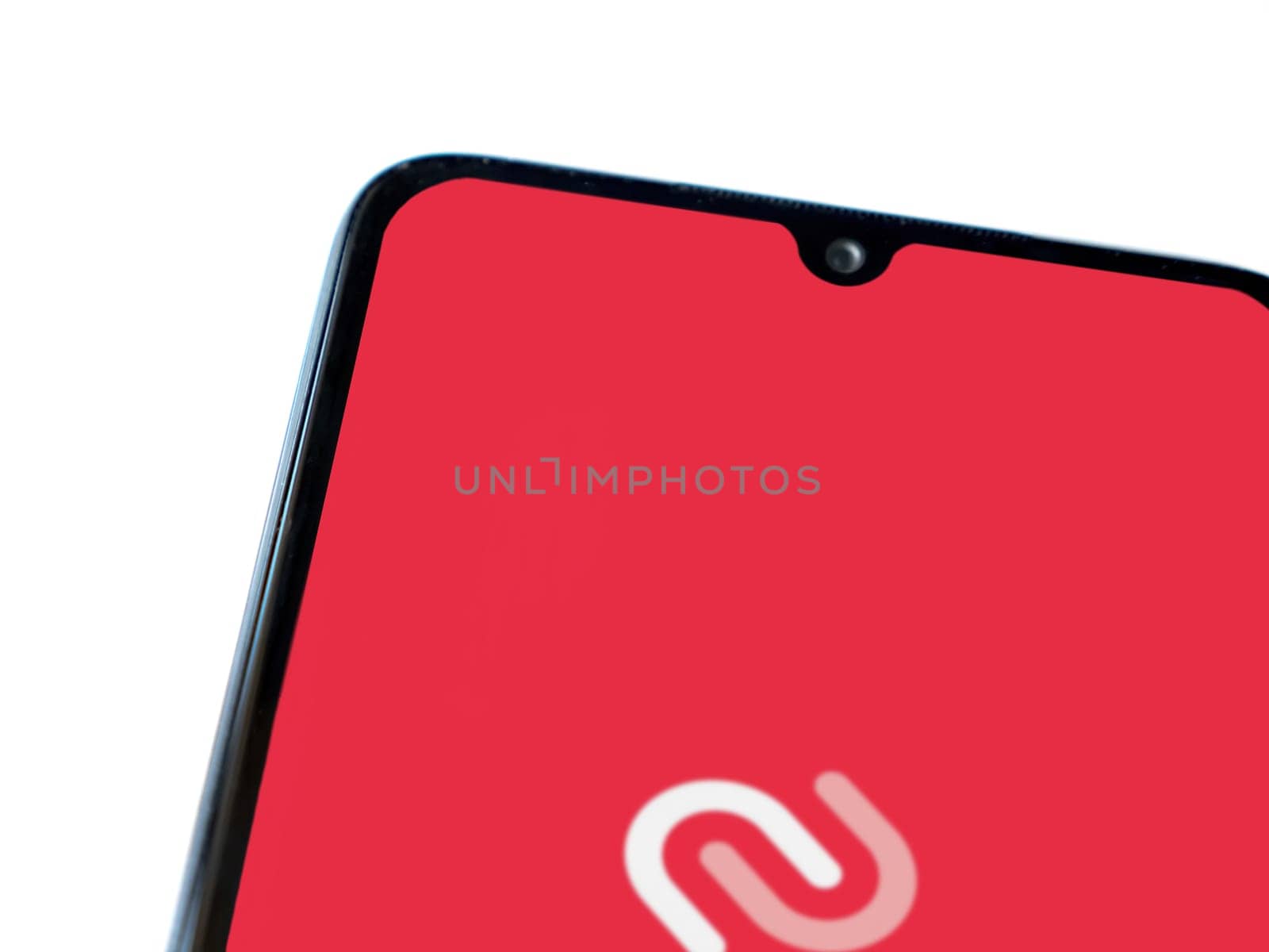 Lod, Israel - July 16,2023: Twilio Authy Authenticator app launch screen on smartphone on white background. Top view flat lay with copy space.