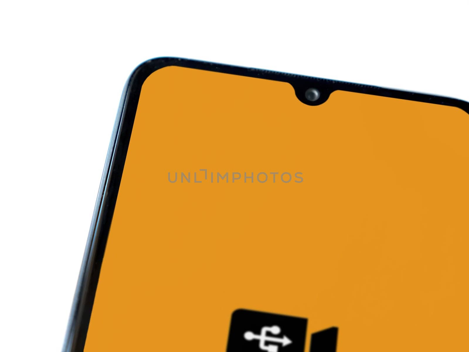 Lod, Israel - July 16,2023: USB Camera app launch screen on smartphone on white background. Top view flat lay with copy space.