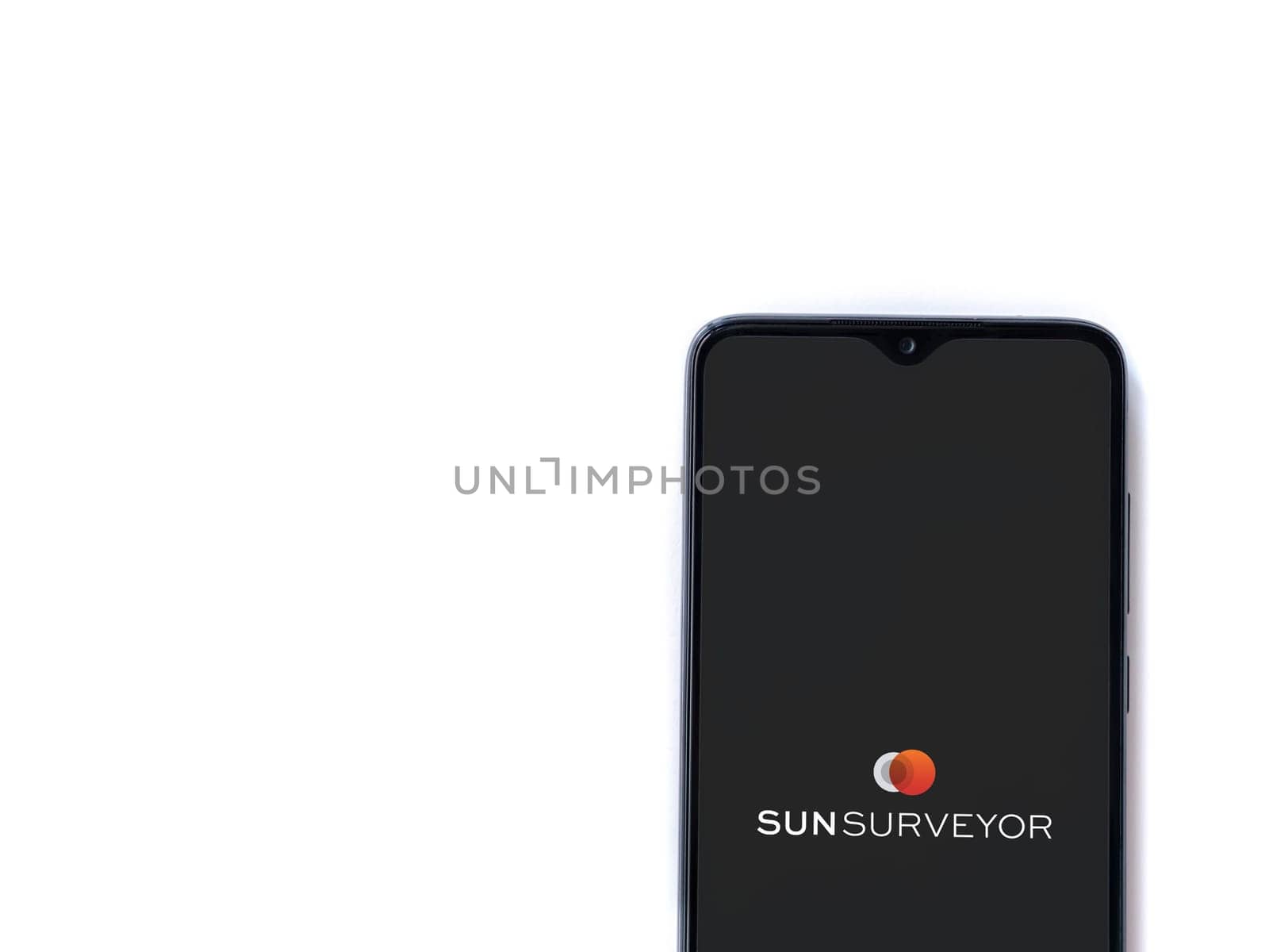 Lod, Israel - July 16,2023: Sun Surveyor app launch screen on smartphone on white background. Top view flat lay with copy space.