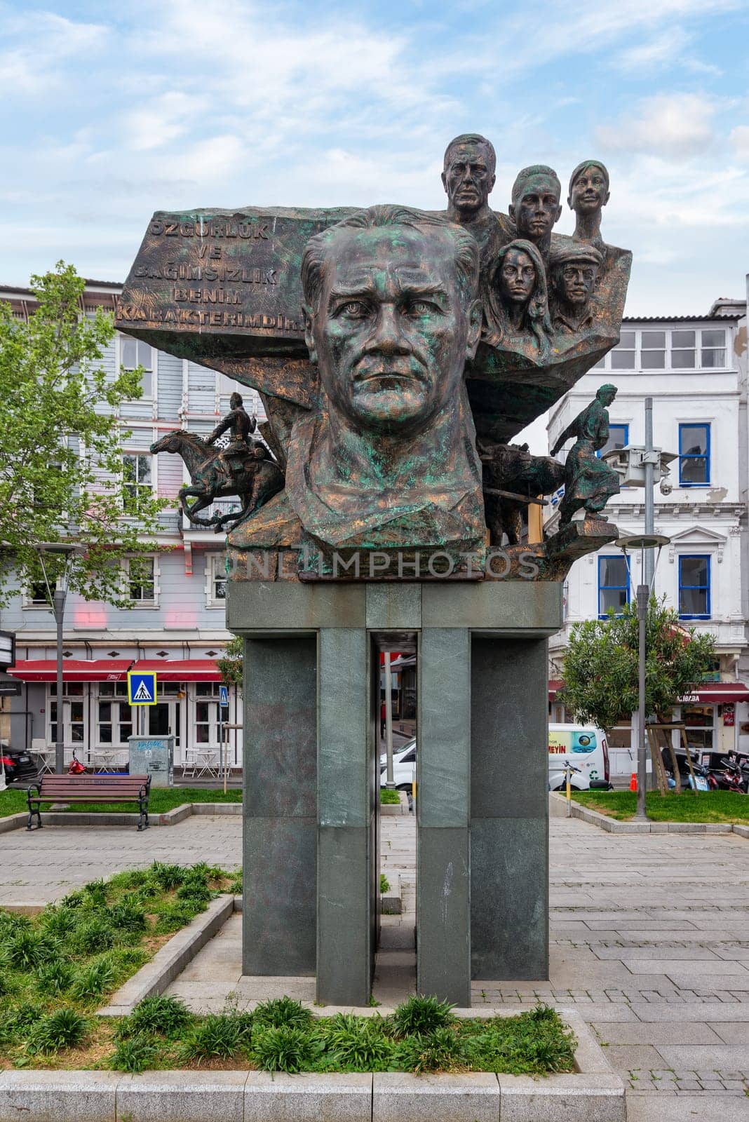 Istanbul, Turkey - May 12, 2023: Bronze statue on a tall pillar of founder of Turkish Republic, Mustafa Kemal Ataturk in Arnavutkoy