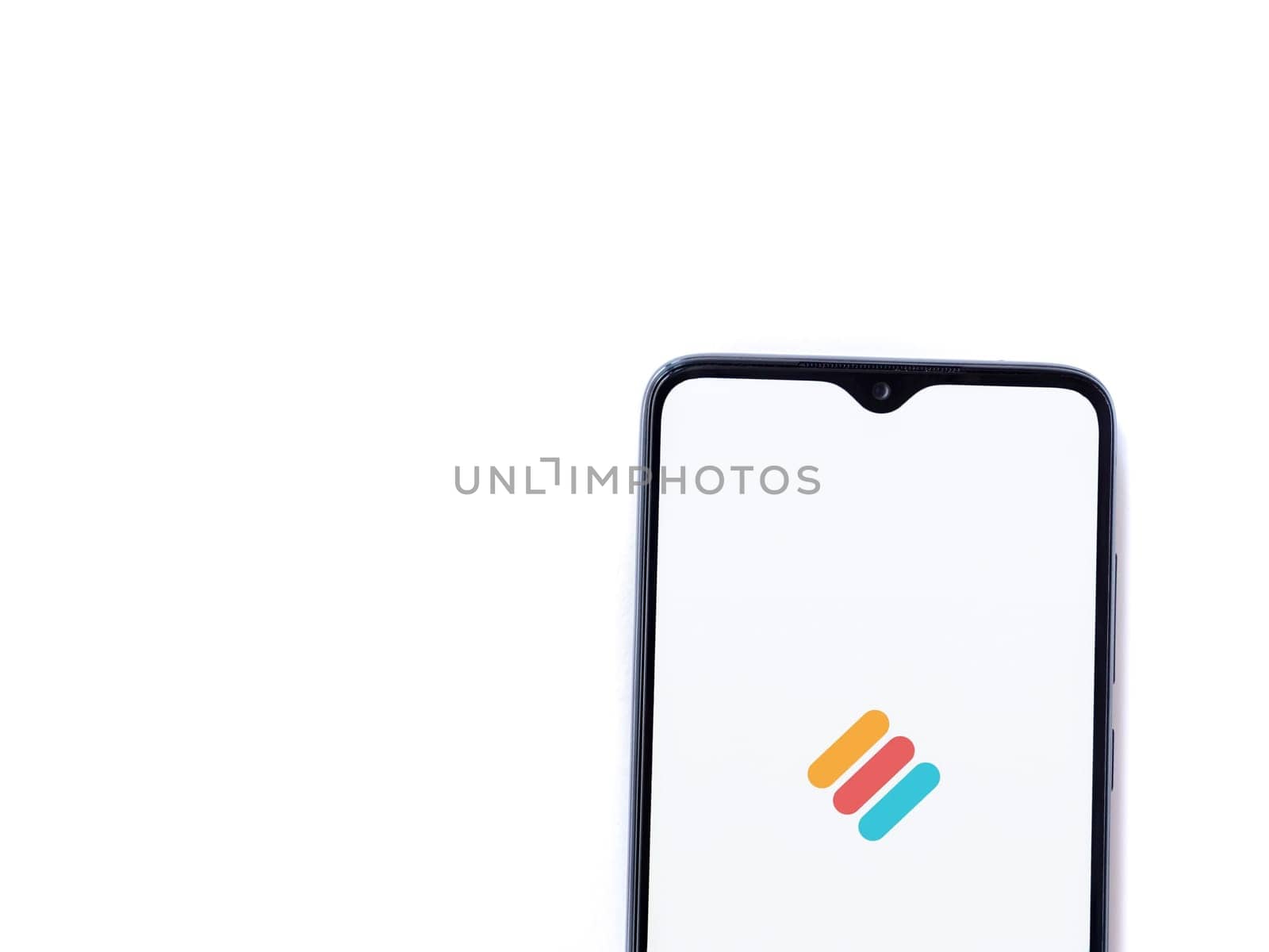 Lod, Israel - July 16,2023: Memorigi app launch screen on smartphone on white background. Top view flat lay with copy space.