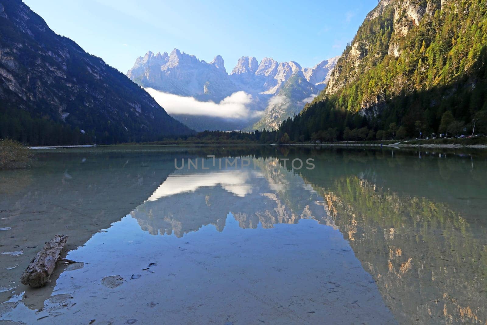The mountains are reflected in the Dürrensee in the Dolomites in South Tirol