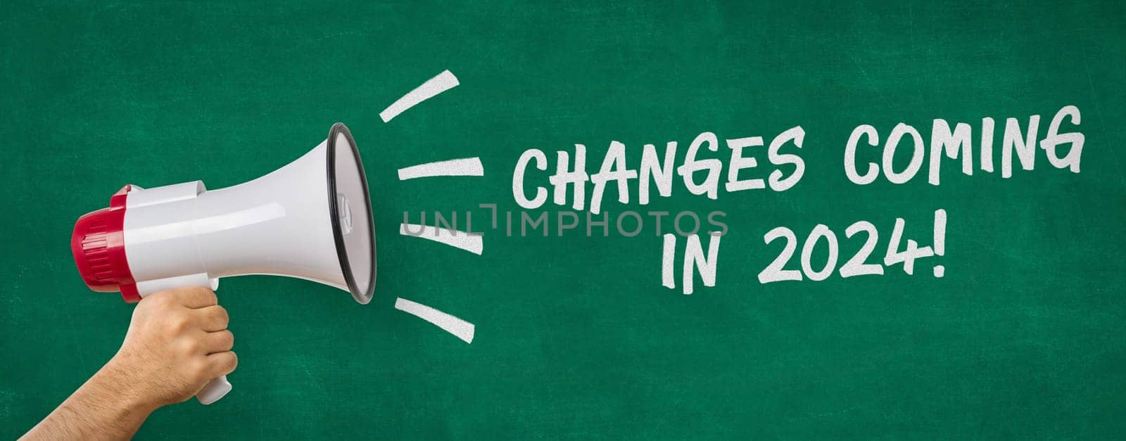 A man holding a megaphone - Changes coming in 2024